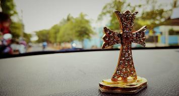 Cross Pentecost close-up on blurred background