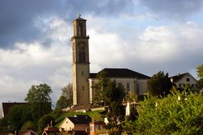 Reformed church Suwaida among green trees in switzerland