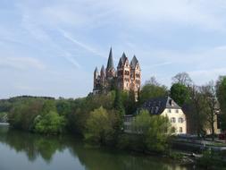 distant view of the church above the river in Limburg