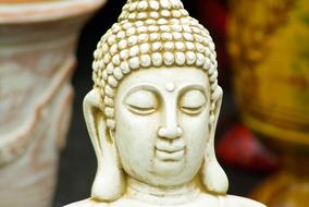 Beautiful statue of Buddha in India, in sunlight
