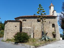 Beautiful stone building among the plants, in Ventimiglia, Italy