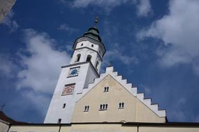 Beautiful Church St Andreas in Babenhausen, Germany, under the blue sky with clouds