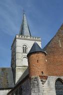 church with a tower in nord pas-de-calais, France