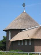 thatched roof church on the north sea