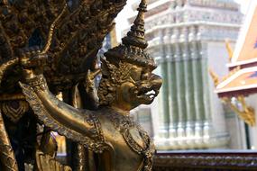 Garuda, fantasy creature, bronze figure at buddhist temple, thailand