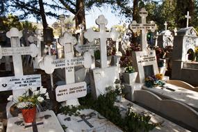 graves with crosses in the cemetery in the village, greece