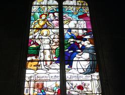 creative colorful stained glass design in church