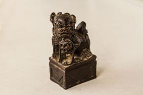 dog figurine in religion