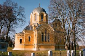 monastery with yellow walls against the blue sky