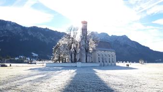 church in the nature of the alps in winter