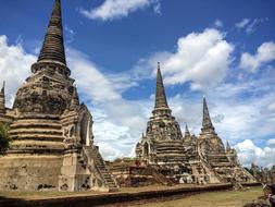 Beautiful landscape with the temple in Thailand, under the blue sky with white clouds