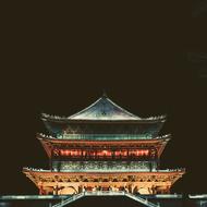 Beautiful and colorful temple with lights, at dark sky on background, at the night