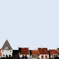 Beautiful buildings with red roofs in the village