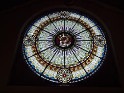 Colorful and beautiful stained glass window with the patterns, in the reformed church in Adiswil, Switzerland