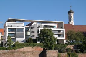 church with a spire in the architecture of a modern city