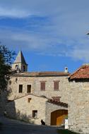 Houses and Bell Tower in Village