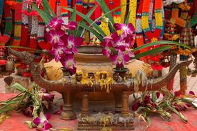 sacrifice, buddhism, orchid, thailand