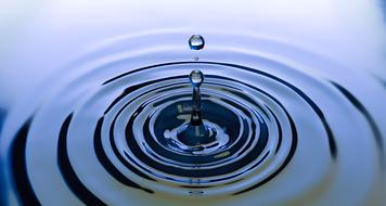 droplet falling into liquid