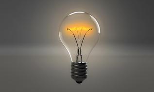 vintage lightbulb at grey background