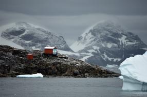 scientific base on the background of glaciers in Antarctica