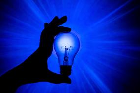Light Bulb Energy hand