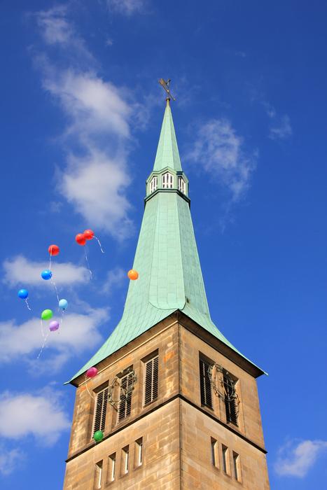 balloons over the church bell tower