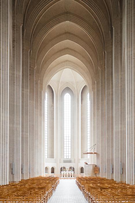 benches and arches in the church