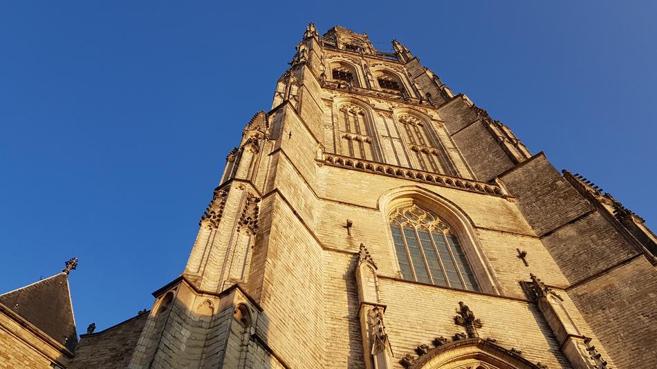 Beautiful church in Breda, Netherlands, in sunlight, under the blue sky