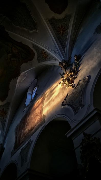 Beautiful, sacral basilica in baroque style, with light in Germany