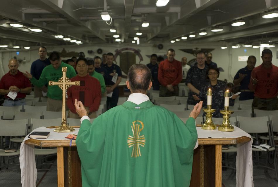 photo of a priest at a service in the Catholic Church