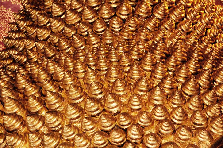 Top view of the beautiful, shiny gold Buddha statues