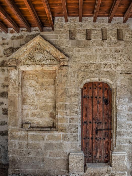 wooden doors in stone medieval architecture