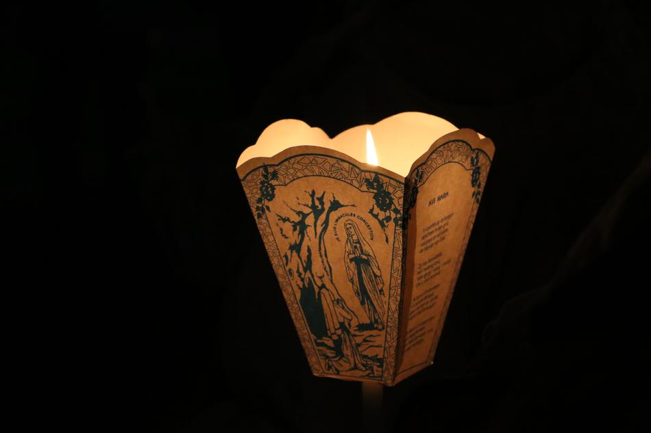 traditional candle for prayer on black background