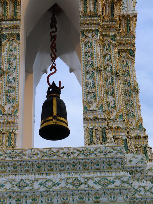 Beautiful old bell in the colorful, decorated tower in Thailand
