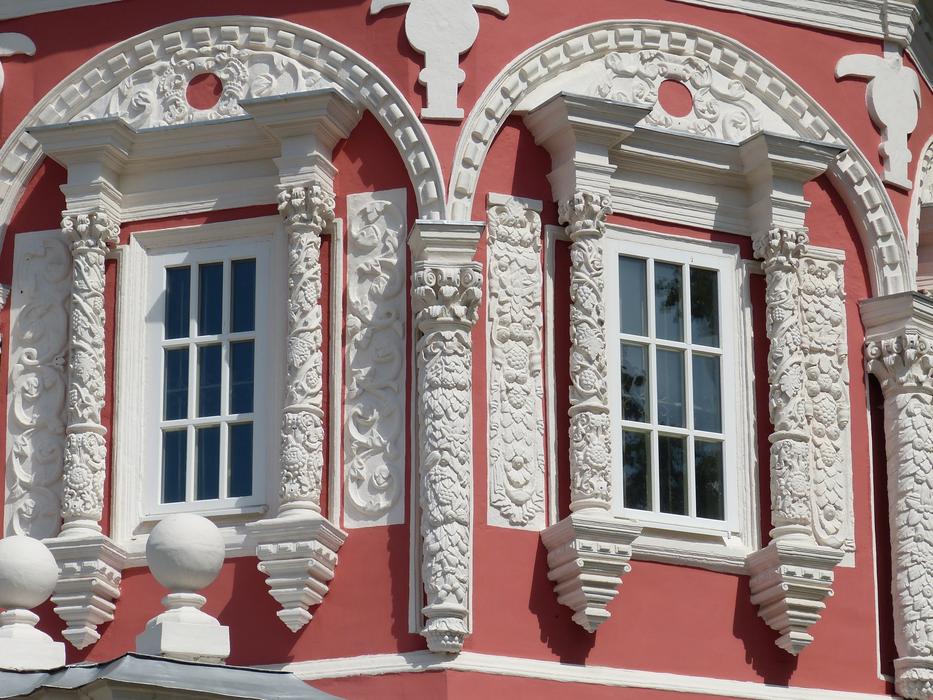 Beautiful, red and white, patterned monastery in Sergiev Posad, Russia, in light