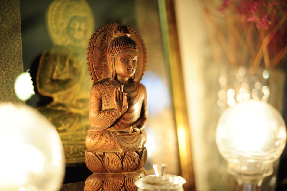 Beautiful and colorful, shiny Buddha statue, among the lights