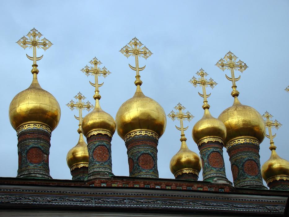 golden domes with crosses on the Church of the Intercession of the Holy Mother of God