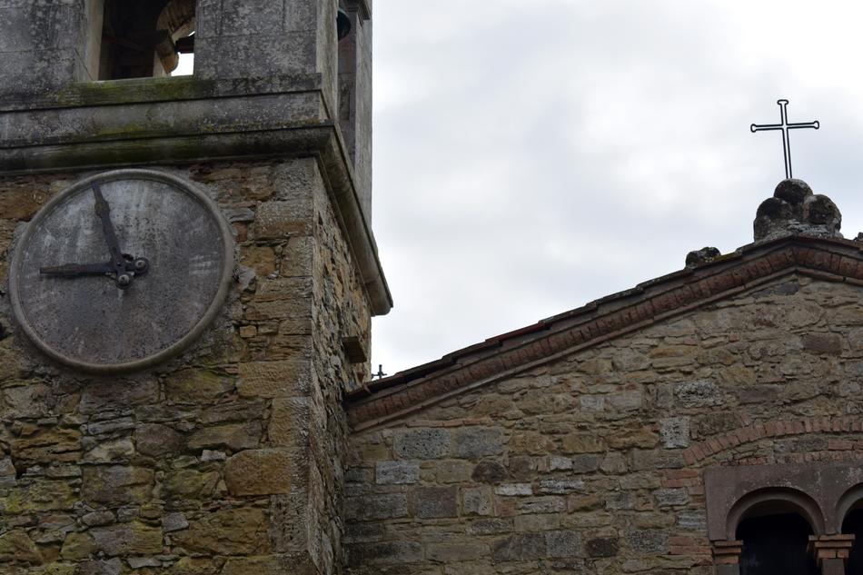clock on old stone church