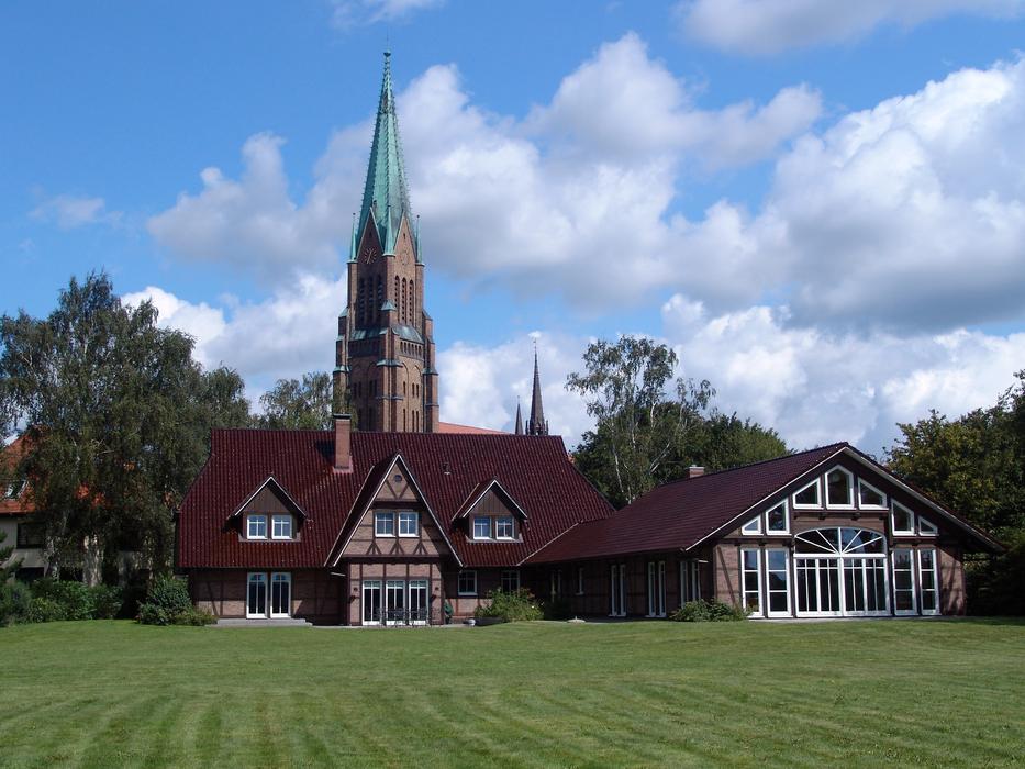 grass in front of a church in Mecklenburg
