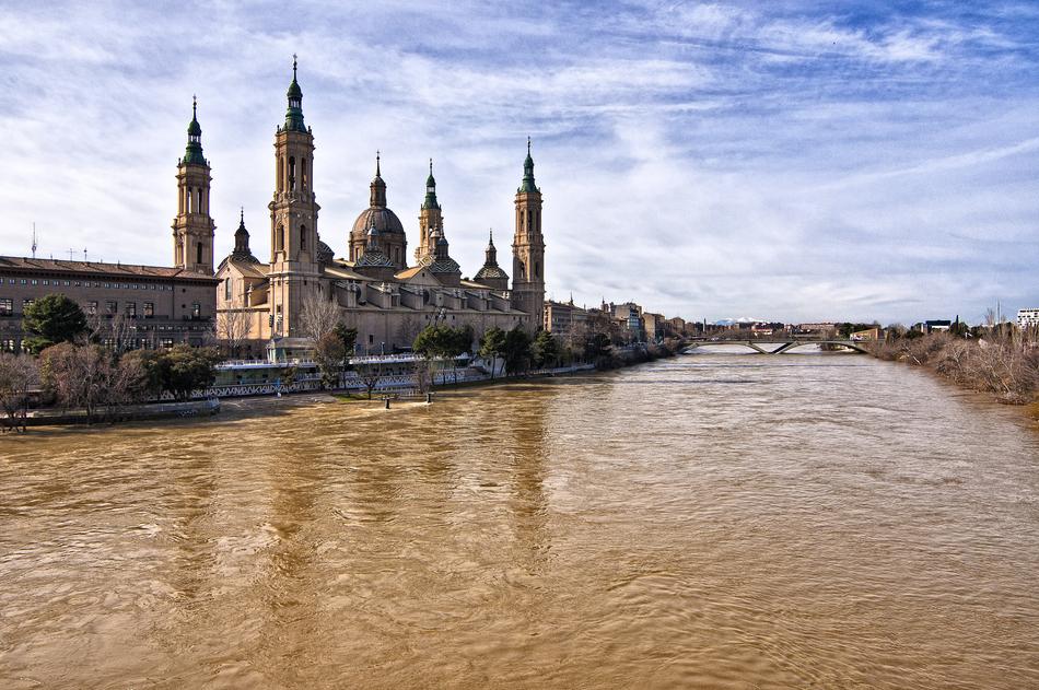 temple with stone walls on the river bank