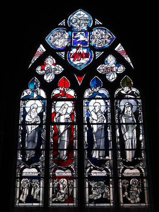 Beautiful and colorful church window with the patterns in Fritzlar, Germany