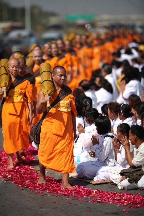 monks at the ceremony in a blurred background
