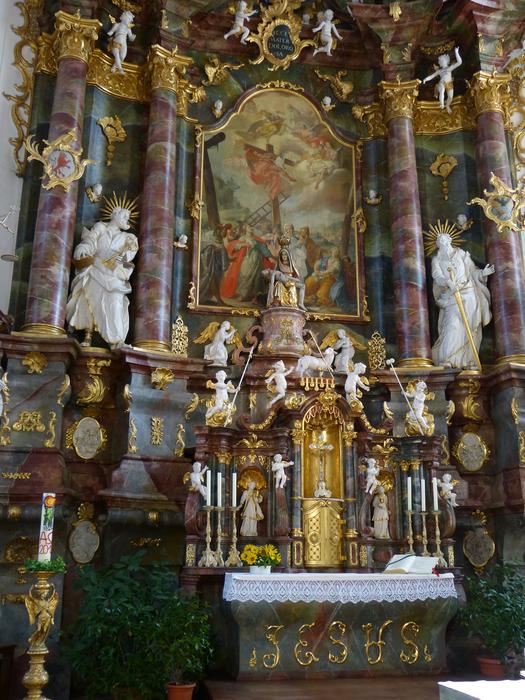 sculptures near the altar in the church