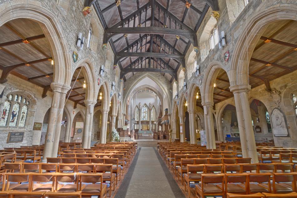 Interior of the cathedral with chairs and columns, in light