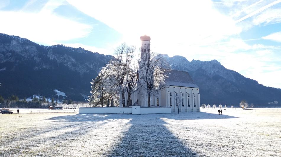 church in the nature of the alps in winter