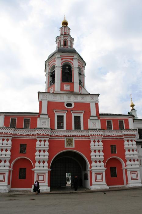 road in front of the architecture of the monastery