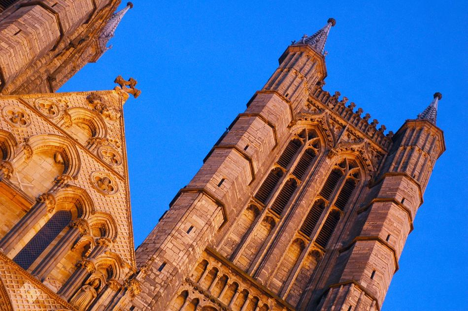 Beautiful cathedral building with the steeples, under the blue sky