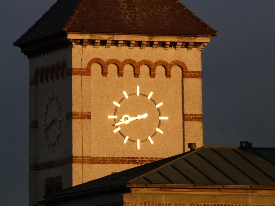 Colorful and beautiful steeple with the clock