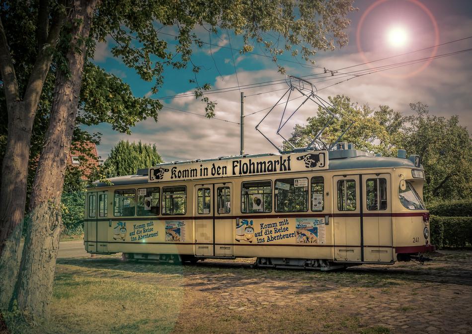 painted vintage tram against the evening sky