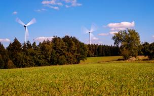 Landscape of the spinning pinwheels on a meadow